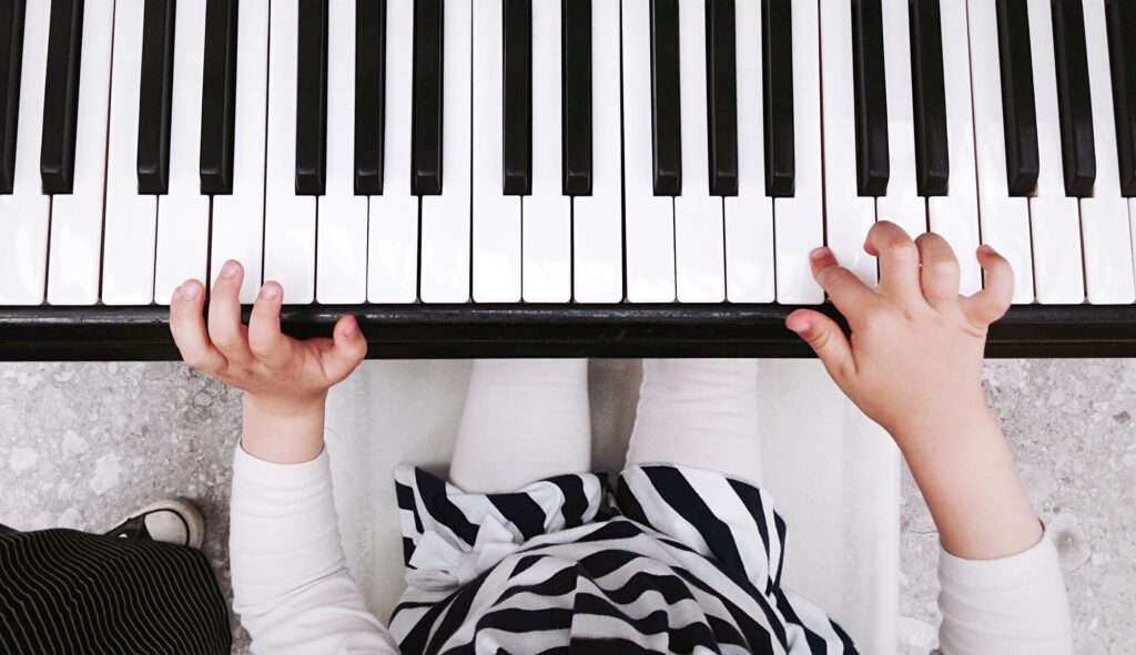 Child playing piano