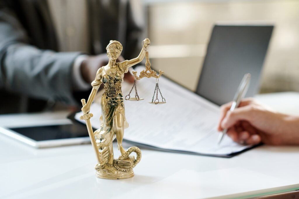 Law statuette in lawyer office