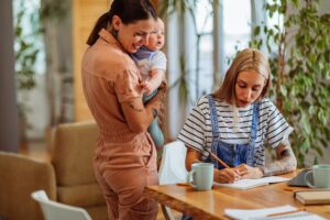 Same sex couple with baby at home